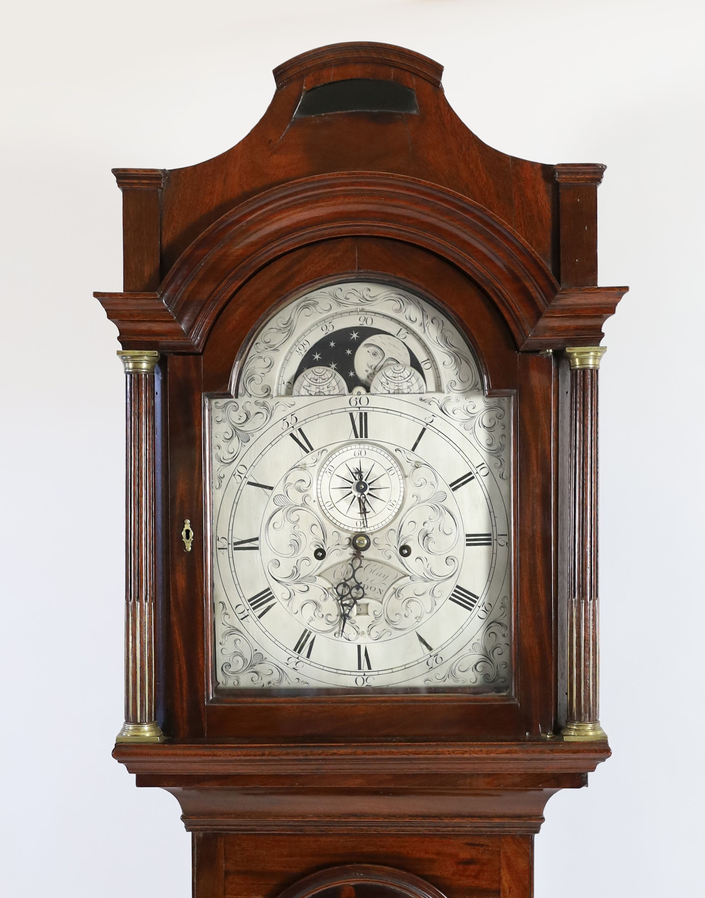 A George III mahogany cased eight day longcase clock, by Charles Clay, London, the 30cm arched silvered dial with moonphase, subsidiary seconds and calendar aperture, height 224cm